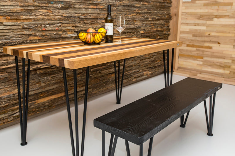 Black hairpin bench with a minimalist design, featuring sleek metal legs and a simple wooden seat for modern style.