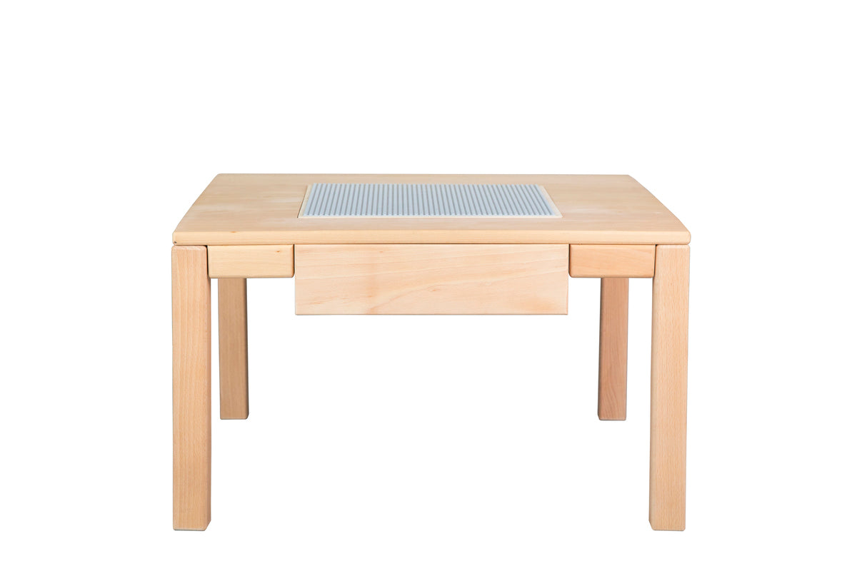 Wooden multifunctional LEGO table with storage drawers and a buildable surface for creative play.