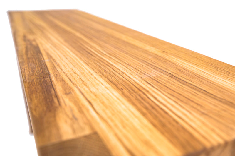 Natural oak bench with a sleek, minimalist design, perfect for adding warmth and style to any room or entryway.