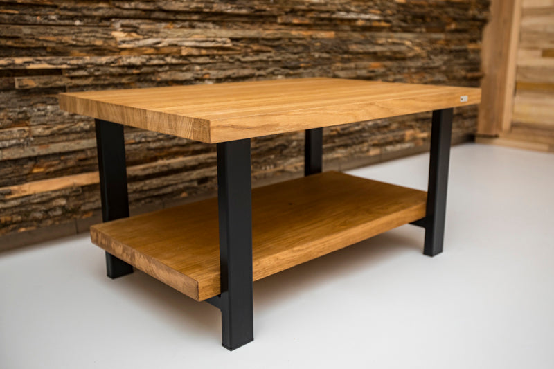 Oak double-decker coffee table with two levels for storage and a sleek, natural wood finish for a modern look.