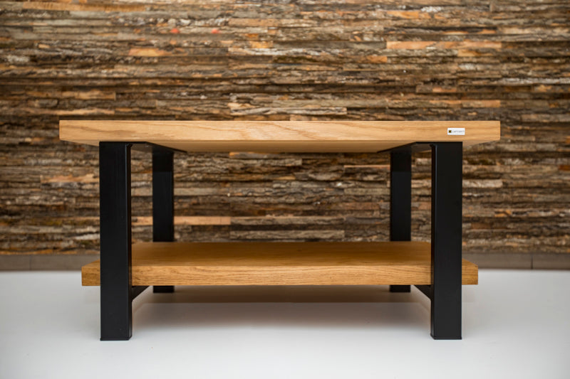 Oak double-decker coffee table with two levels for storage and a sleek, natural wood finish for a modern look.