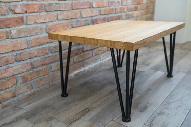 Scandinavian hairpin oak coffee table with a minimalist design, natural wood surface, and sleek metal legs for a modern look.