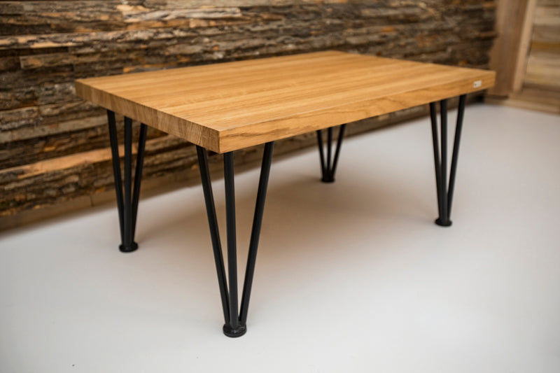 Scandinavian hairpin oak coffee table with a minimalist design, natural wood surface, and sleek metal legs for a modern look.