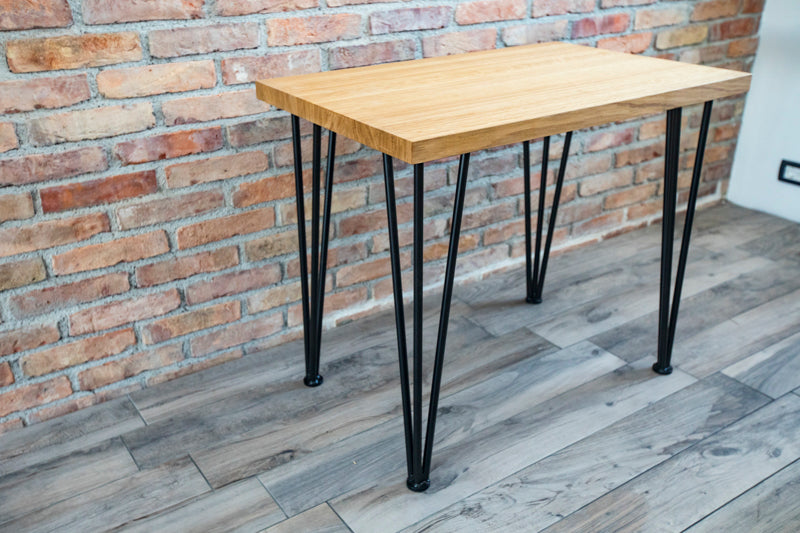 Scandinavian-style hairpin oak desk with a clean design, natural wood finish, and sleek metal legs for a modern look.
