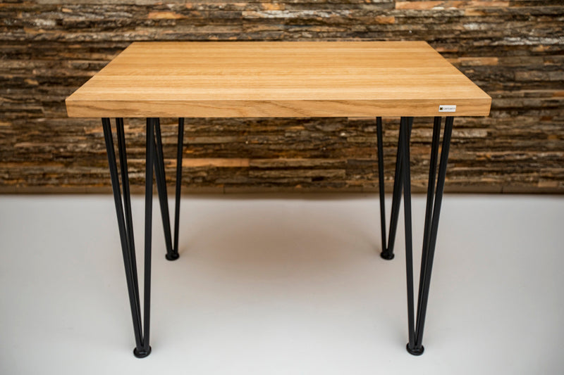 Scandinavian-style hairpin oak desk with a clean design, natural wood finish, and sleek metal legs for a modern look.
