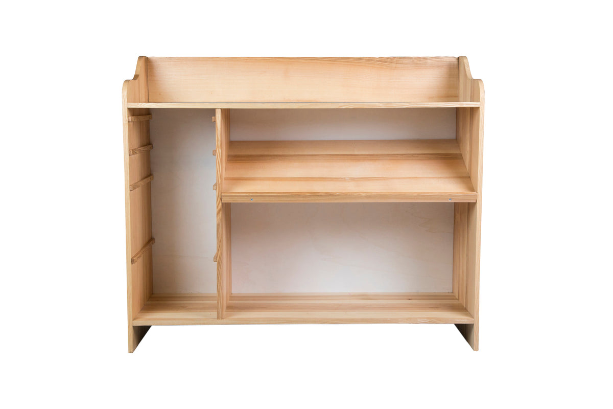 Toy storage organizer with multiple compartments for neat and easy storage in a child's playroom.