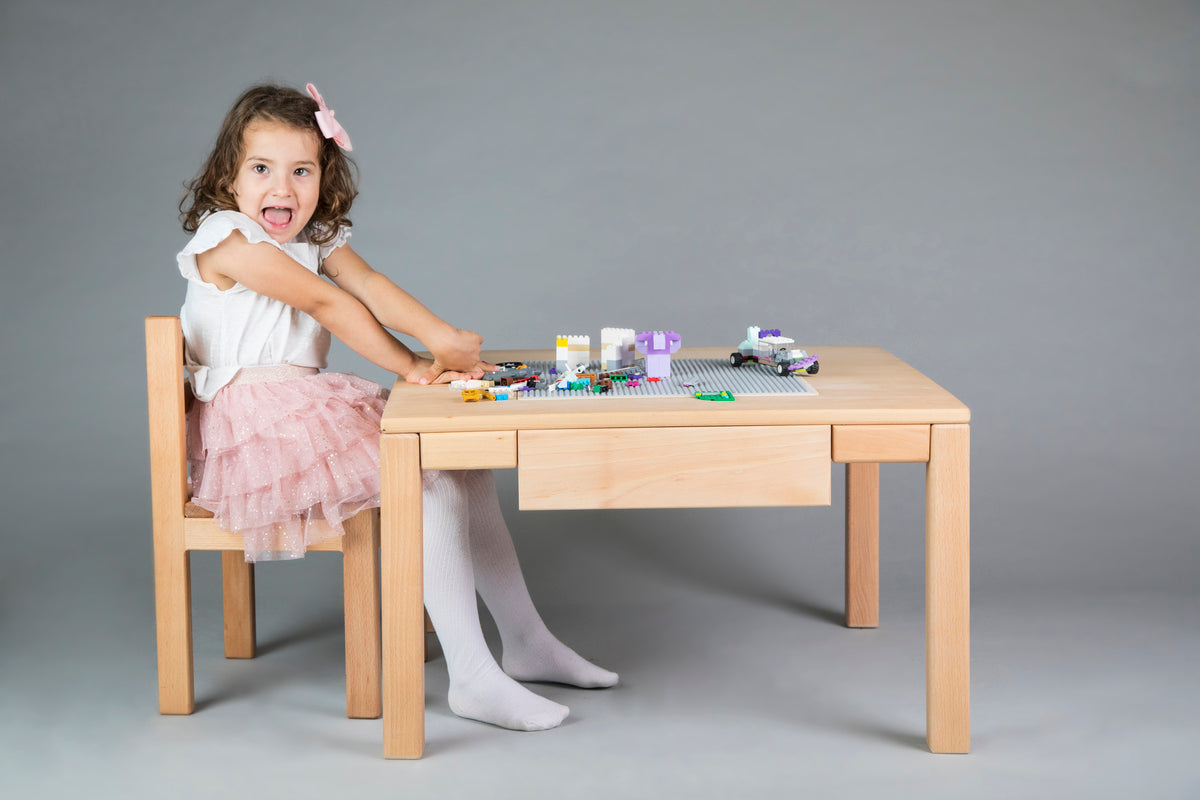 Wooden kids chair with a simple, sturdy design, featuring a smooth finish and comfortable seat for young children.