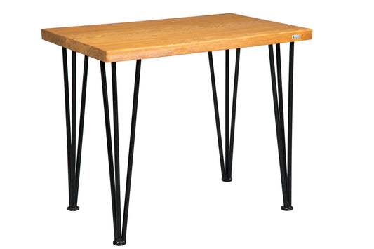 Hairpin spruce desk with sleek metal legs and a natural wood finish for a modern, minimalist look.