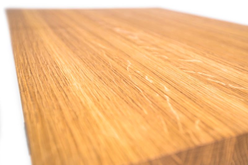 Industrial style oak coffee table with a natural wood surface and metal frame, offering a rustic yet modern look.