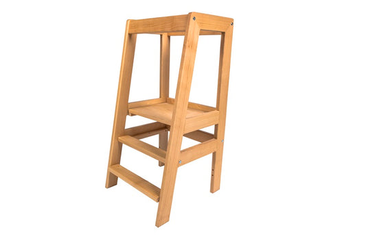 Montessori learning tower with a safe, sturdy design, helping young children reach countertops for independent learning.