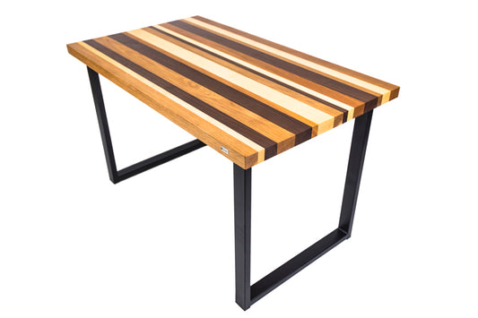 Multi-color dining table with a vibrant design, blending various hues for a bold and modern look in any dining space.