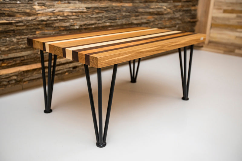 Multi-color hairpin coffee table with vibrant hues and sleek metal legs, adding a bold, modern touch to any living room.